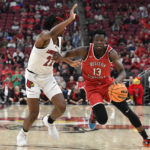 Louisville gets first win of season behind Ellis' 30 points