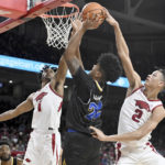 Brazile, No. 11 Arkansas break away from San Jose St 99-58