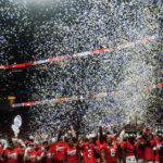 SEC halftime contest booed, both students awarded $100,000