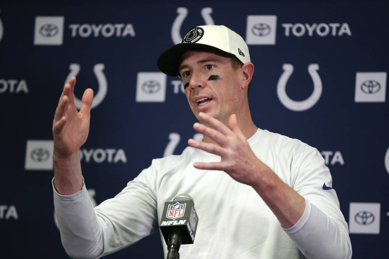 Indianapolis Colts quarterback Matt Ryan speaks during a news conference after an NFL football game...