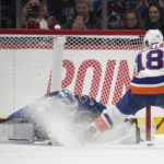 Georgiev stops 26 shots, Avs beat Isles 1-0 in shootout