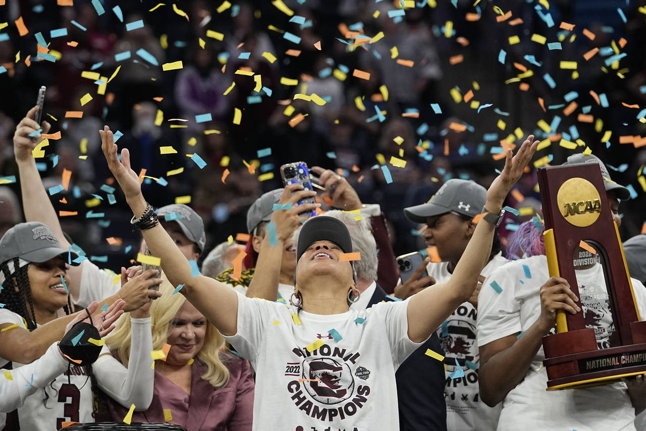 FILE - South Carolina head coach Dawn Staley celebrates after a college basketball game in the fina...