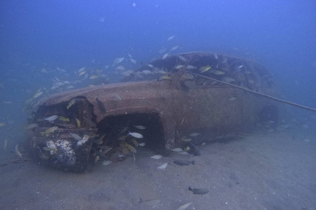 A sunken vehicle sit in the Mesaieed sea-line at the GMC dive site in Mesaieed, Qatar Wednesday, No...