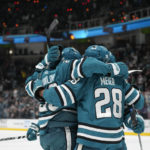 Karlsson has goal and 3 assists, Sharks beat Wild 5-2