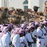 AP PHOTOS: Camels a common sight for World Cup visitors