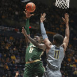 Johnson scores 17 to help West Virginia beat UAB 71-60