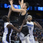Magic beat Spurs 133-113 for 8th victory in 9 games