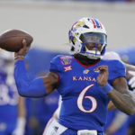 Kansas rallies, but Arkansas wins Liberty Bowl 55-53 in 3OTs