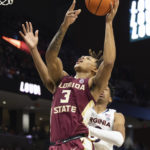Clark's 18 lift No. 3 Virginia past Florida St in ACC opener