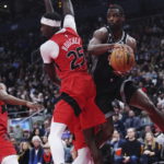 Fox has 27 points and 10 assists, Kings beat Raptors 124-123