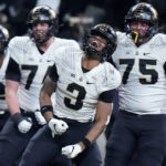 No. 2 Michigan beats Purdue 43-22 for Big Ten crown