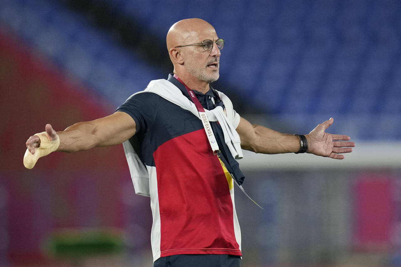 FILE - Spain's coach Jose Luis de la Fuente reacts during the men's final soccer match against Braz...