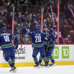 Pettersson scores early in OT, Canucks beat Canadiens 7-6