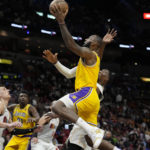 Heat get past Lakers 112-98, climb over .500 at 18-17