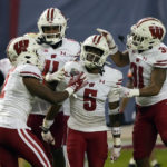Wisconsin beats Oklahoma State 24-17 in Guaranteed Rate Bowl