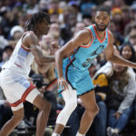 Jokic, Nuggets outlast Suns 128-125 in OT; Booker sidelined