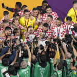 AP PHOTOS: World Cup highlights from Day 23