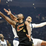 Cavaliers beat Mavericks 100-99 in OT on Allen's slam