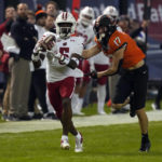 Wisconsin beats Oklahoma State 24-17 in Guaranteed Rate Bowl
