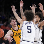 Roach leads No. 15 Duke past Iowa 74-62 in Jimmy V Classic