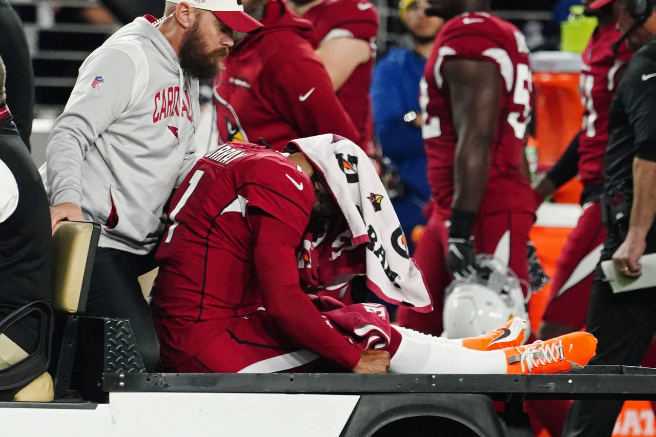 Arizona Cardinals quarterback Kyler Murray (1) is brought off the field after an injury during the ...