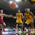 Wahl sparks Wisconsin to 78-75 victory over Iowa in overtime