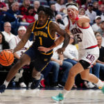 No. 4 Arizona rebounds from first loss, beats winless Cal