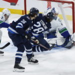 Scheifele scores 3, Jets beat Canucks to snap 3-game skid