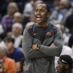 Hawkins leads unbeaten No. 8 UConn past Okla St 74-64