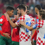 AP PHOTOS: World Cup highlights from Day 23