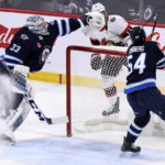 Connor's 3-point game leads Jets past Senators 5-1