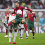 AP PHOTOS: World Cup highlights from Day 17