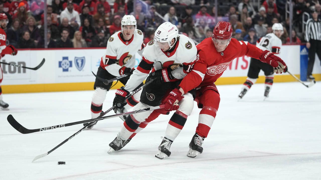Detroit Red Wings left wing Elmer Soderblom (85) defends Ottawa Senators right wing Drake Batherson...
