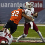 Wisconsin beats Oklahoma State 24-17 in Guaranteed Rate Bowl