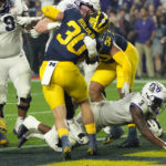 No. 3 TCU upsets No. 2 Michigan 51-45 in wild CFP semifinal