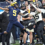 No. 2 Michigan beats Purdue 43-22 for Big Ten crown