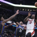 Butler's late flurry helps Heat put away Pacers 87-82