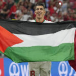 Morocco reaches last 16 of World Cup, beats Canada 2-1