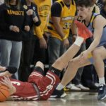 Hepburn paces Wisconsin to 80-77 OT win over Marquette