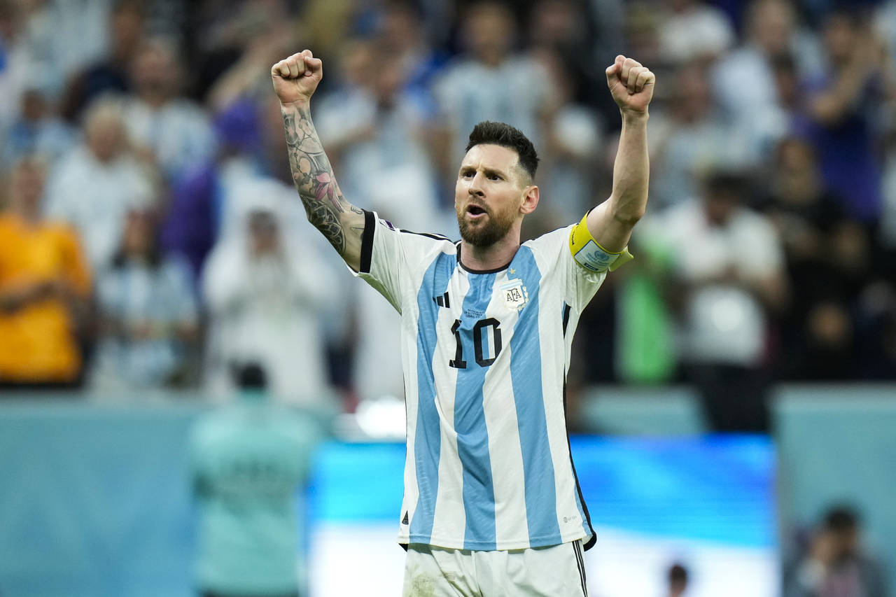 Argentina's Lionel Messi celebrates after scoring Argentina's second goal during the World Cup quar...
