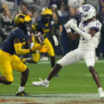 No. 3 TCU upsets No. 2 Michigan 51-45 in wild CFP semifinal