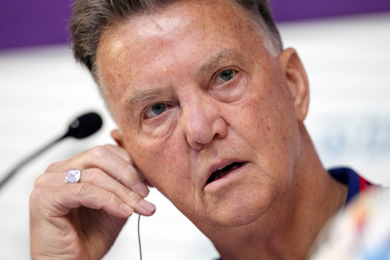 Head coach Louis van Gaal of the Netherlands adjusts his audio device during Netherlands official p...