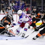 Rangers beat struggling Flyers 6-3 for 6th straight win