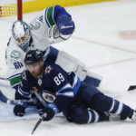 Scheifele scores 3, Jets beat Canucks to snap 3-game skid