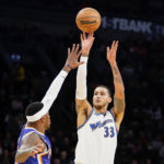 Wizards snap losing streak at 10, beat Suns 113-110