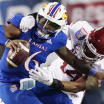 Kansas rallies, but Arkansas wins Liberty Bowl 55-53 in 3OTs