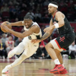 Spurs rout Rockets 124-105 with 26 from Vassell