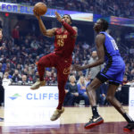 Mitchell scores 34, Cavaliers top Magic 107-96