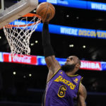 Davis injured, but LeBron leads Lakers past Denver 126-108