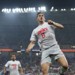 AP PHOTOS: World Cup highlights from Day 13
